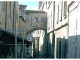 Street scene of Via Dolorosa in Jerusalem through the archway which is the only remains of the fortress of Antonia.